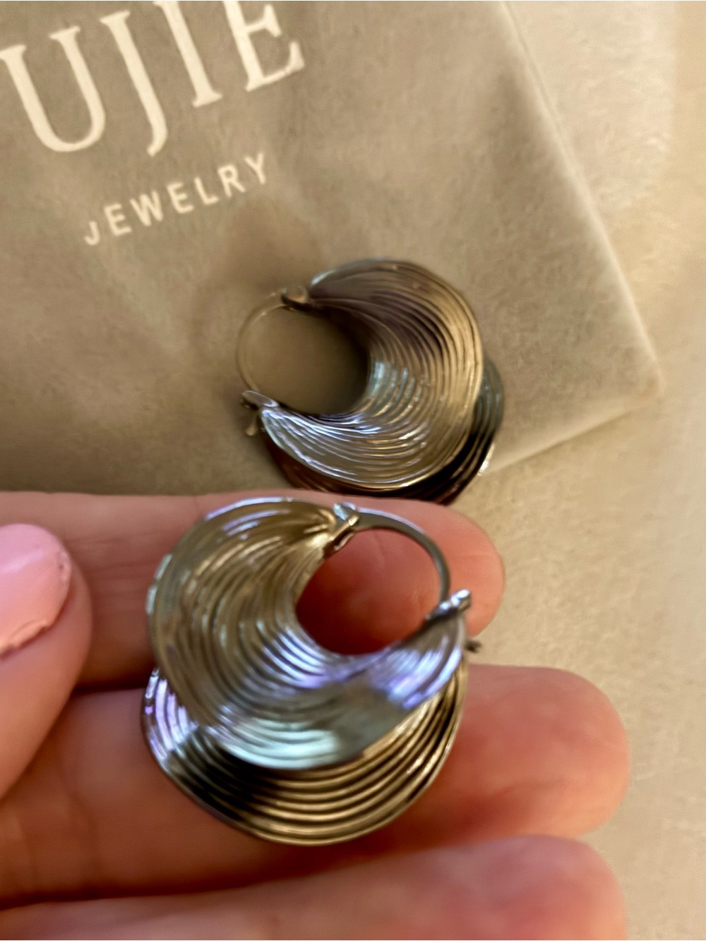 Silver Textured Hoop Earrings by Yujie